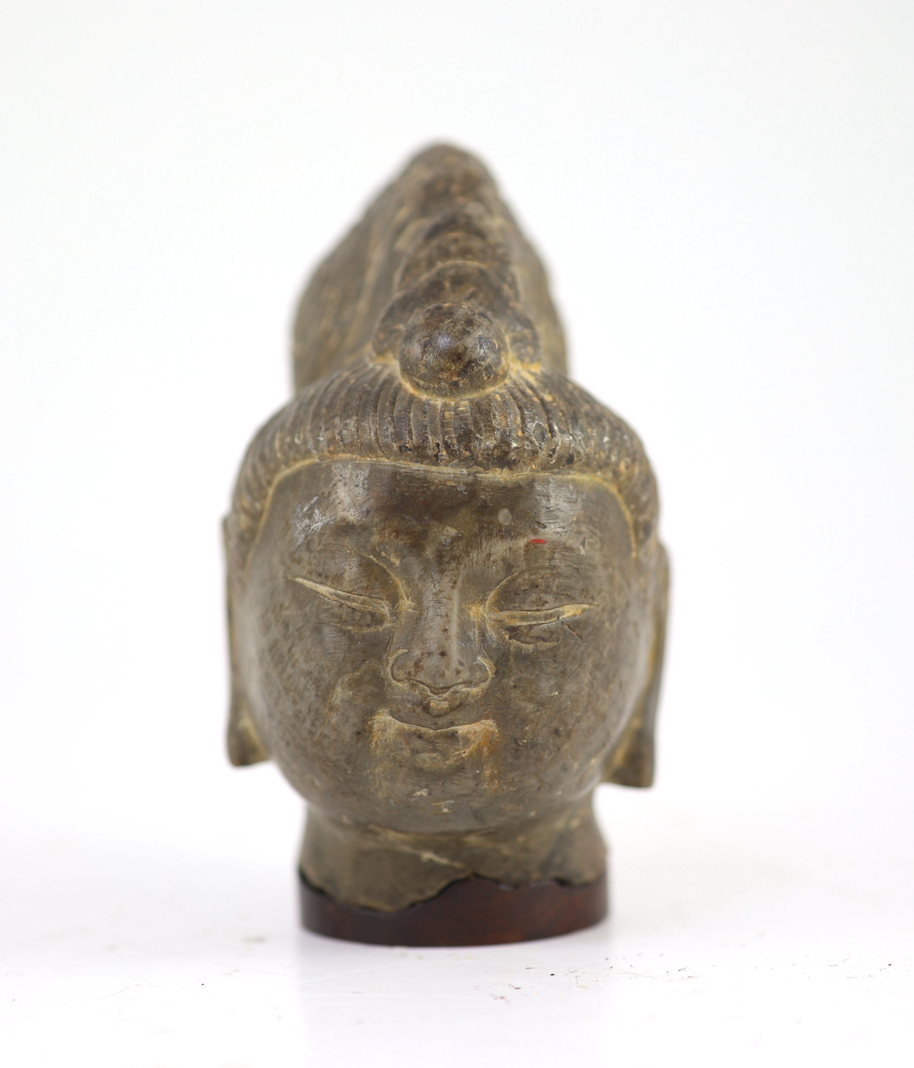 A Chinese grey marble head of Guanyin, Ming dynasty or earlier, 16cm high